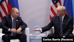 Трамп и Путин на саммите в Германии