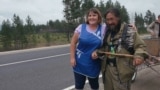 Shaman walks through Russia and meets people 