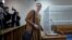 BELARUS -- Maryna Zolatava, editor in chief of the website Tut.by, who was accused of illegally obtaining information from a state-run news agency, arrives to attend a court hearing in Minsk, February 12, 2019
