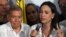Venezuelan opposition leader Maria Corina Machado talks to the media next to opposition presidential candidate Edmundo Gonzalez Urrutia, following the presidential election results in Caracas on July 29, 2024.