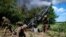UKRAINE – Ukrainian service members fire a shell from a M777 Howitzer near a frontline, as Russia's attack on Ukraine continues, in Donetsk Region, June 6, 2022