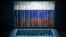 GENERIC – Russian hacker. Hacking laptop with binary computer code and russia flag on the screen. Internet and network security.