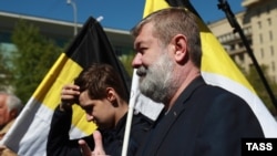 Vyacheslav Maltsev (front) takes part in a Russian opposition rally on May 6.