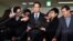 South Korea -- Lee Jae-yong (C), vice chairman of Samsung Electronics, arrives to be questioned as a suspect in a corruption scandal that led to the impeachment of President Park Geun-Hye, at the office of the independent counsel in Seoul on February 13, 