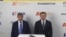 A screenshot from the opening of the Vladivostok branch of the company A7. Moldovan oligarch Ilan Shor (L) and co-executive Pyotr Fradkov. 