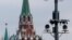 RUSSIA --Surveillance cameras on a lamppost in central Moscow, with Troitskaya Tower of Kremlin behind