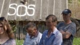 Жители разваливающегося поселка в Казани написали на стенах и крышах SOS