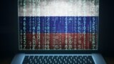 GENERIC – Russian hacker. Hacking laptop with binary computer code and russia flag on the screen. Internet and network security.