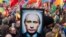 Карикатура на Путина на ЛГБТ-прайде в Амстердаме