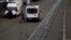 RUSSIA -- Ambulances are seen parked outside a temporary a hospital for patients infected with the coronavirus disease (COVID-19) at the Lenexpo Exhibition Complex in St. Petersburg, November 11, 2020