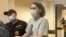RUSSIA -- Blogger Yury Khovansky is escorted to a court hearing in St. Petersburg, June 10, 2021