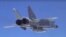 RUSSIA -- MiG-31 supersonic interceptor aircraft with the Kh-47M2 Kinzhal air-launched ballistic missile during drills, July 19, 2018