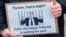 NETHERLANDS – Poster "Putin, the Hague Tribunal is waiting for you!" on actions against Russia's aggression against Ukraine. Amsterdam, March 6, 2022