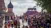 RUSSIA -- Hundreds of tourists stand in line to visit the mausoleum of Soviet state founder Vladimir Lenin at Red Square in Moscow, August 9, 2017