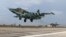 Российский бомбардировщик SU-25 на авиабазе Хмеймим в Латакии, Сирия, октябрь 2015 года 