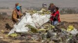 ETHIOPIA -- Rescuers work at the scene of an Ethiopian Airlines flight crash near Bishoftu, or Debre Zeit, south of Addis Ababa, Ethiopia, Monday, March 11, 2019.