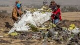 ETHIOPIA -- Rescuers work at the scene of an Ethiopian Airlines flight crash near Bishoftu, or Debre Zeit, south of Addis Ababa, Ethiopia, Monday, March 11, 2019.