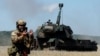 Украинские военные ведут огонь из самоходной артиллерийской установки. Донецкая область, 3 октября 2022 года