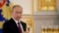 Russia - Russia's President Vladimir Putin holds a glass during a ceremony of receiving diplomatic credentials from foreign ambassadors at the Kremlin in Moscow, Russia, November 9, 2016