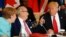 Tunisia's President Beji Caid Essebsi (C) gestures to U.S. President Donald Trump as German Chancellor Angela Merkel (L) looks on at the G7 Summit expanded session in Taormina, Sicily, Italy May 27, 2017.