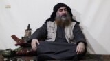 In this undated and unlocated tv grab taken from a video released by Al-Furqan media, the chief of the Islamic State group Abu Bakr al-Baghdadi appears for the first time in five years in a propaganda video. 