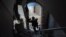 This handout picture released by the Israeli army on December 12, 2023 shows soldiers raiding a building in the northern Gaza Strip, amid continuing battles between Israel and the Palestinian militant group Hamas.