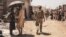 AFGHANISTAN -- Canadian coalition forces member walks through an Evacuation Control Checkpoint (ECC) during an evacuation at Hamid Karzai International Airport, Kabul, August 24, 2021