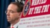 U.S. -- U.S. Deputy Attorney General Rod Rosenstein speaks at a news conference with other law enforcement officials at the Justice Department to announce nine Iranians charged with conducting massive cyber theft campaign, in Washington, March 23, 2018