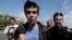 Russia -- Opposition activist Roman Dobrokhotov (C) is detained by the police outside the Cathedral of Christ the Savior in Moscow, 29Apr2012