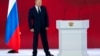 Russian President Vladimir Putin leaves the podium in Moscow's Manezh Central Exhibition Hall after delivering his annual state-of-the-nation speech on April 21, 2021. 