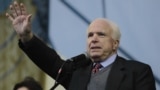 UKRAINE – U.S. Senator John McCain, center, speaks as Democratic senator from the state of Connecticut, during a Pro-European Union rally in Independence Square in Kyiv, Dec. 15, 2013