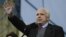 UKRAINE – U.S. Senator John McCain, center, speaks as Democratic senator from the state of Connecticut, during a Pro-European Union rally in Independence Square in Kyiv, Dec. 15, 2013