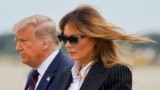 U.S. -- U.S. President Donald Trump walks with first lady Melania Trump at Cleveland Hopkins International Airport in Cleveland, Ohio, U.S., September 29, 2020.