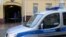 Russia -- A police car is parked outside the offices of former oil tycoon Mikhail Khodorkovsky's Open Russia foundation in Moscow, April 16, 2015