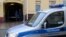 Russia -- A police car is parked outside the offices of former oil tycoon Mikhail Khodorkovsky's Open Russia foundation in Moscow, April 16, 2015