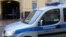 Russia -- A police car is parked outside the offices of former oil tycoon Mikhail Khodorkovsky's Open Russia foundation in Moscow, April 16, 2015