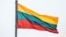 LITHUANIA – Lithuanian flag over the city of Kaunas, which is located 104 kilometers from the capital of Lithuania