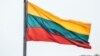 LITHUANIA – Lithuanian flag over the city of Kaunas, which is located 104 kilometers from the capital of Lithuania
