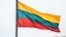 LITHUANIA – Lithuanian flag over the city of Kaunas, which is located 104 kilometers from the capital of Lithuania