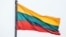 LITHUANIA – Lithuanian flag over the city of Kaunas, which is located 104 kilometers from the capital of Lithuania