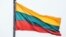 LITHUANIA – Lithuanian flag over the city of Kaunas, which is located 104 kilometers from the capital of Lithuania