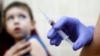 RUSSIA -- A child is vaccinated against measles in Moscow, March 1, 2019