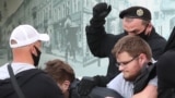 BELARUS -- Law enforcement officers detain participants of a protest after the Belarusian election commission refused to register Viktor Babaryka and Valery Tsepkalo as candidates for the upcoming presidential election in Minsk, July 14, 2020