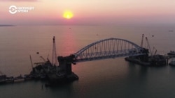 Сколько стоит, кто строил, что по нему возят и как охраняют Крымский мост
