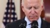 U.S. President Joe Biden delivers hremarks in honor of the 500,000 U.S. deaths from the coronavirus disease (COVID-19) during a ceremony in the Cross Hall at the White House in Washington, U.S., February 22, 2021. 