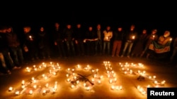 В Сирии вспоминают жертв гражданской войны в канун Нового года (Алеппо, 31 декабря 2014 года)