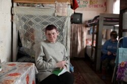 Бездомная женщина в реабилитационном центре в Омской области, февраль 2020 года. Фото: Reuters