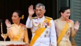 THAILAND -- Thailand's newly crowned King Maha Vajiralongkorn, Queen Suthida and Princess Bajrakitiyabha are seen at the balcony of Suddhaisavarya Prasad Hall at the Grand Palace where King grants a public audience to receive the good wishes of the people