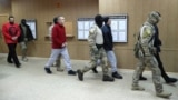RUSSIA -- Detained crew members of Ukrainian naval ships, which were seized by Russia's FSB security service in November 2018, are escorted inside a court building in Moscow, January 15, 2019