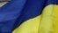 UKRAINE – A Ukrainian national flag flies in front of the government building in central Kyiv, March 3, 2016